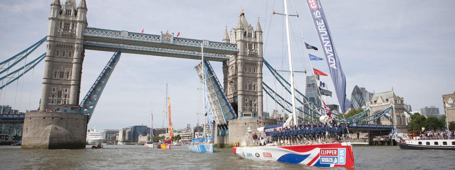Clipper Race fleet pass under Tower Bridge London during 2013-14 race