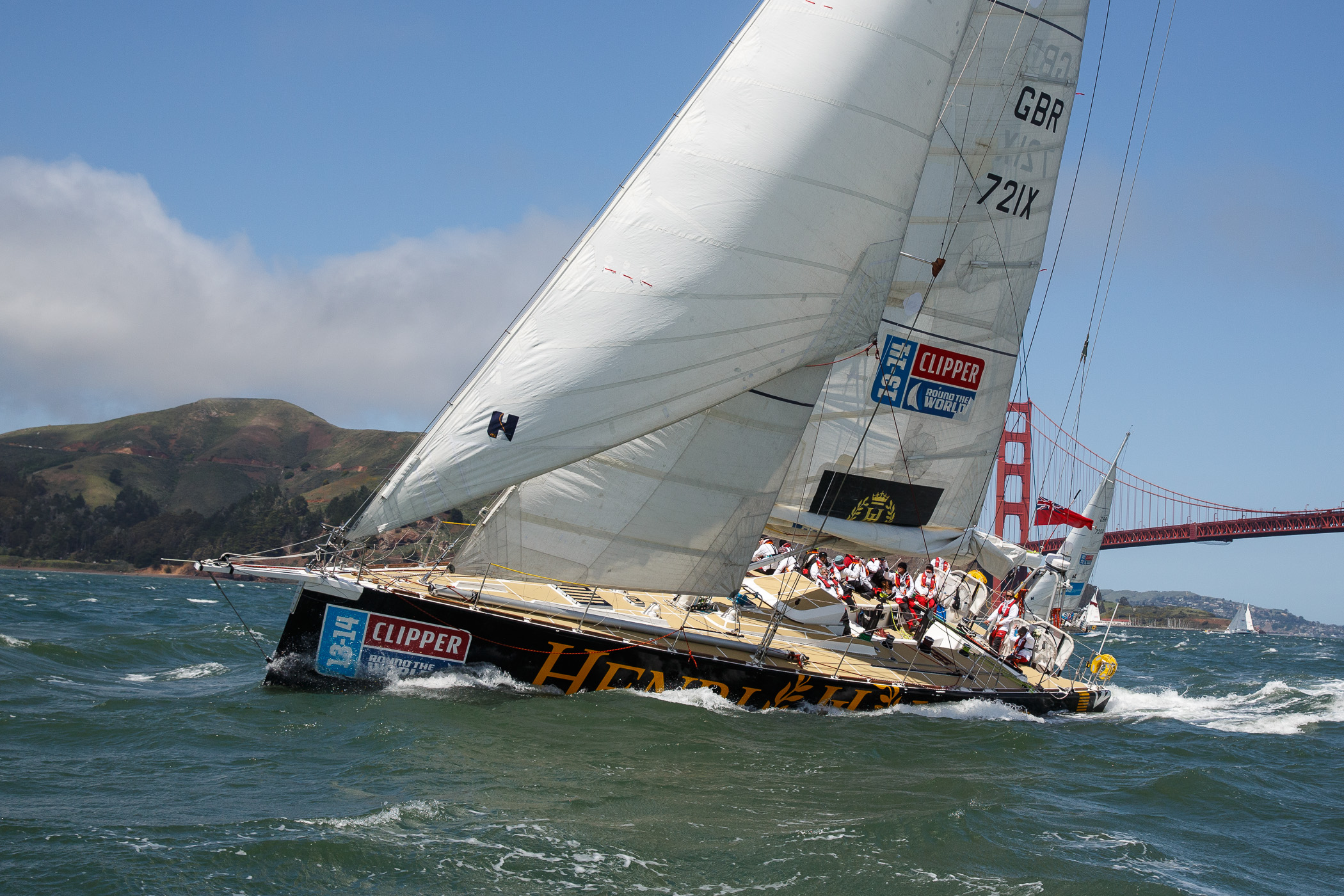 The Henri Lloyd yacht pictured racing under San Francisco's Golden Gate Bridge