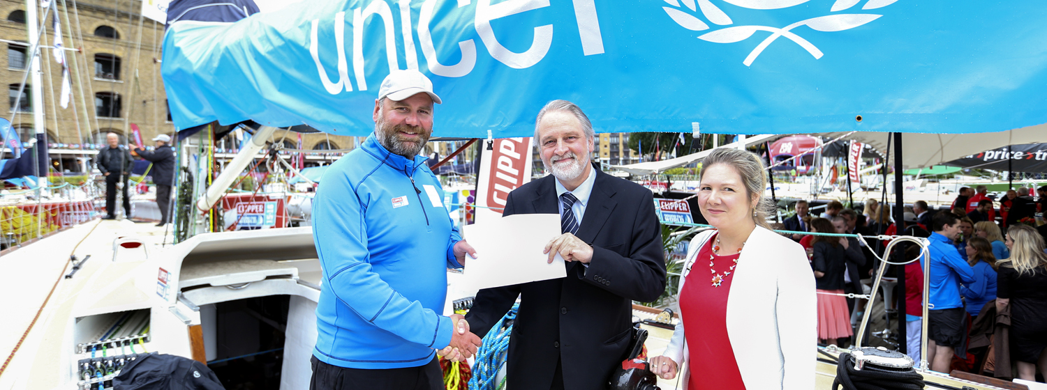 Pictured: Unicef skipper Jim Prendergast received the children’s letter at the race start in London from David Bull, Executive Director and Catherine Cottrell, Deputy Executive Director of Unicef UK.