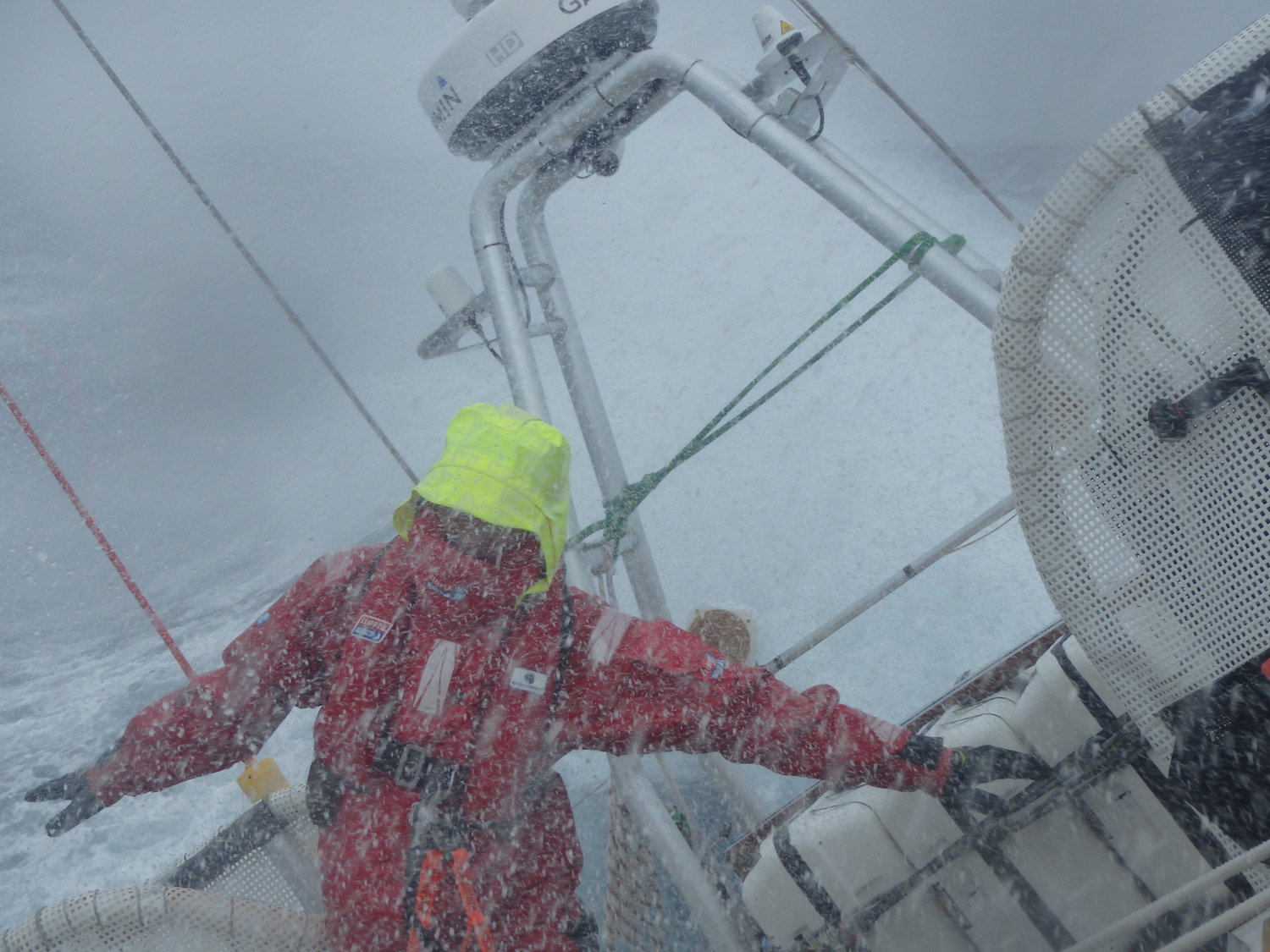 Crew member Nick Bush taking on the elements during the 2013-14 race.