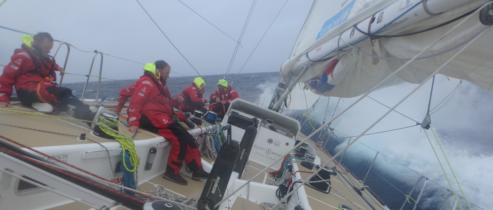 Crew members shown in big waves on board PSP 