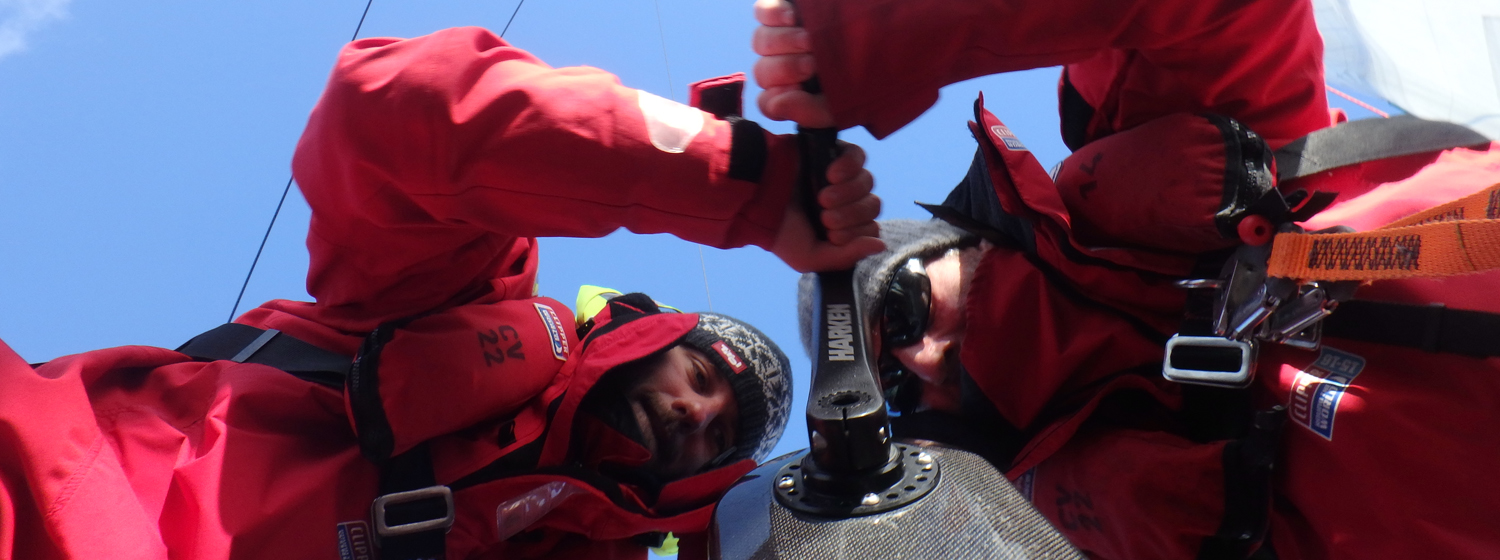 Crew members using the Harken grinder