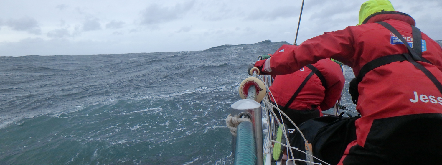 Crew members racing in the Southern Ocean