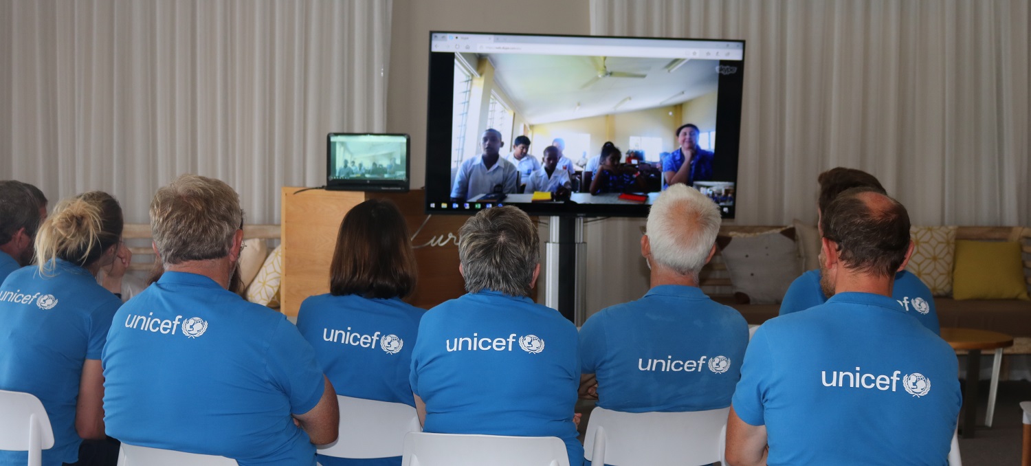Unicef crew on skype call with children from Fiji