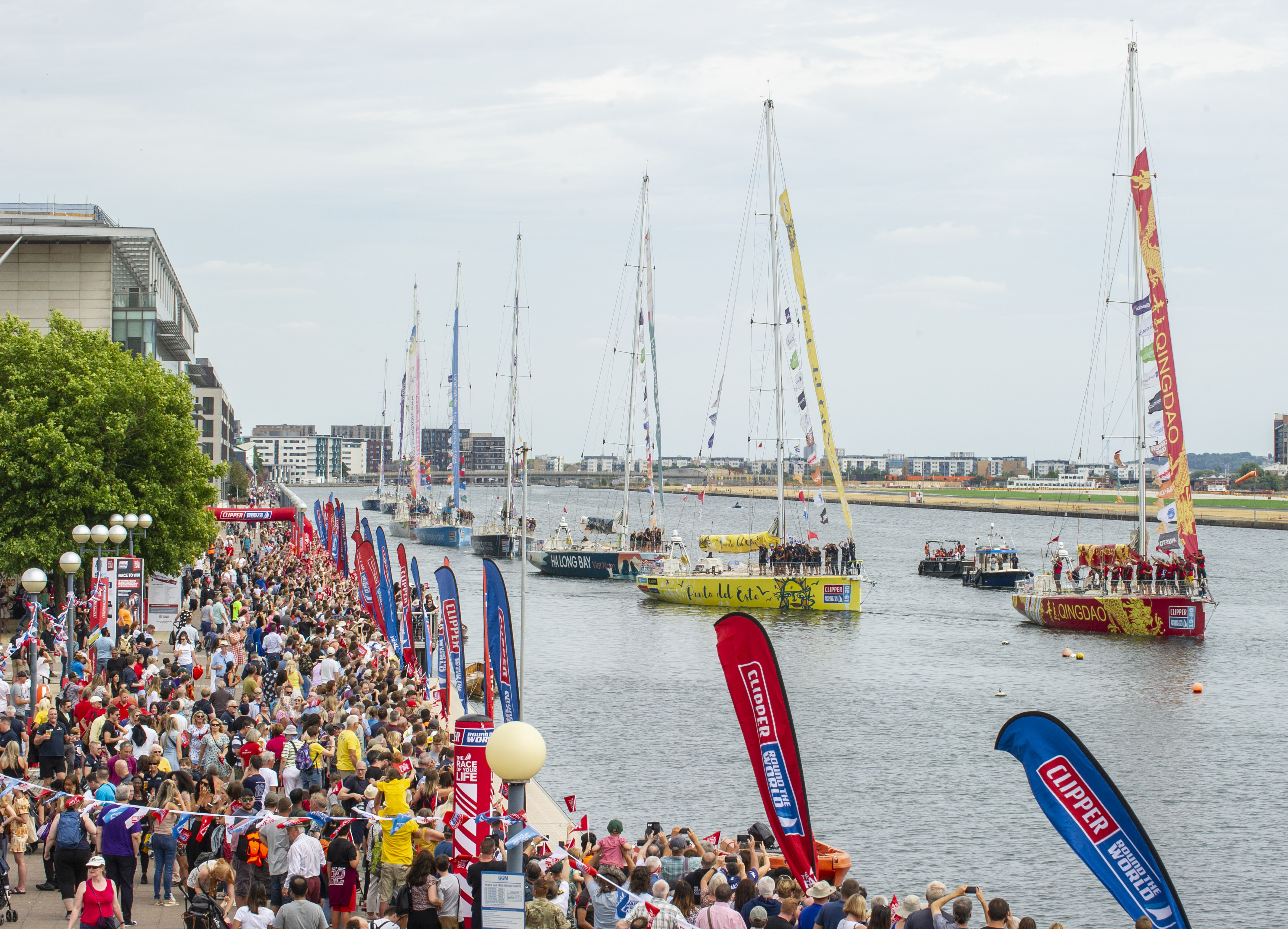 Clipper Race Fleet Parade of Sail at Race Finish in London's Royal Docks