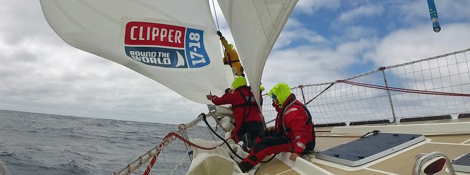 Crew changing sail on board Nasdaq