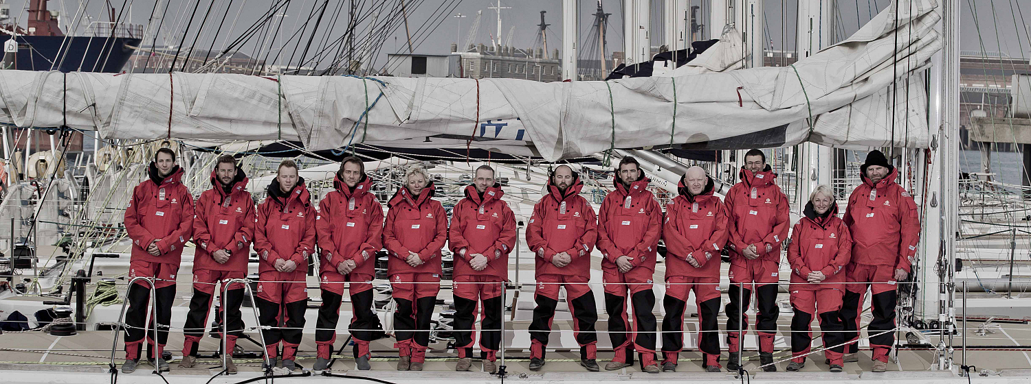 The 2015-16 Clipper Race skippers line-up on a Clipper 70