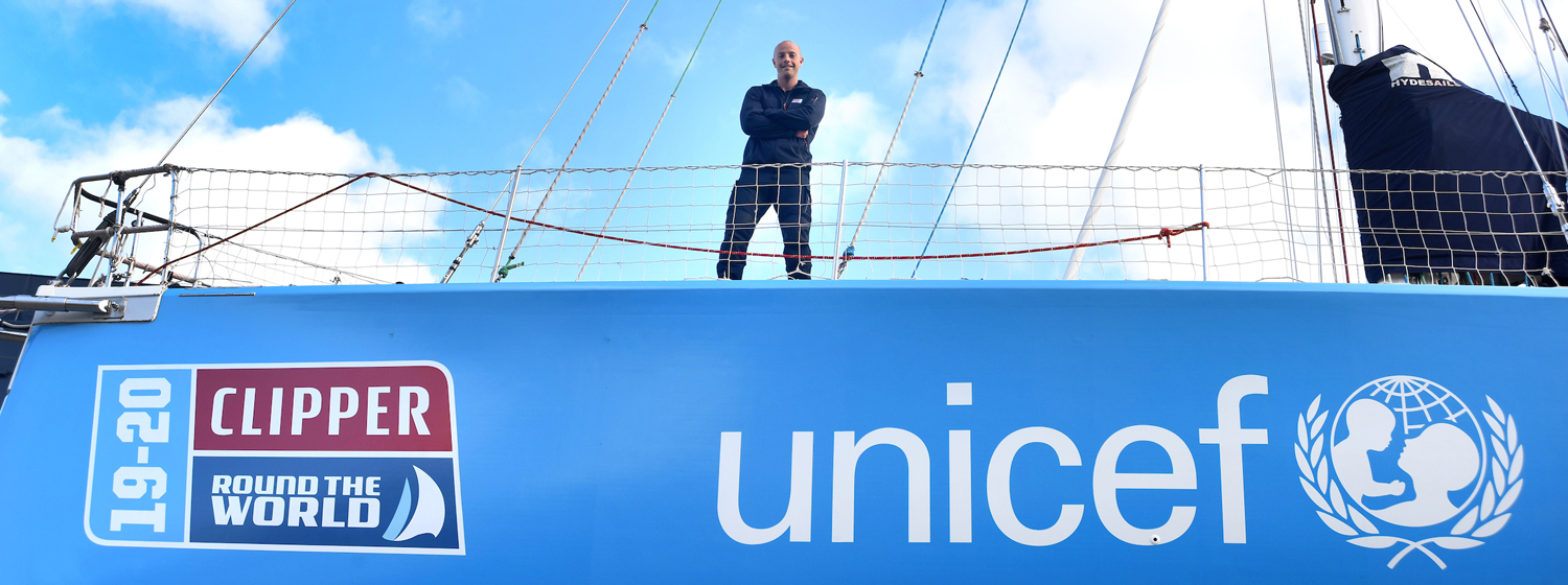Ian Wiggin aboard the newly branded Unicef UK Yacht