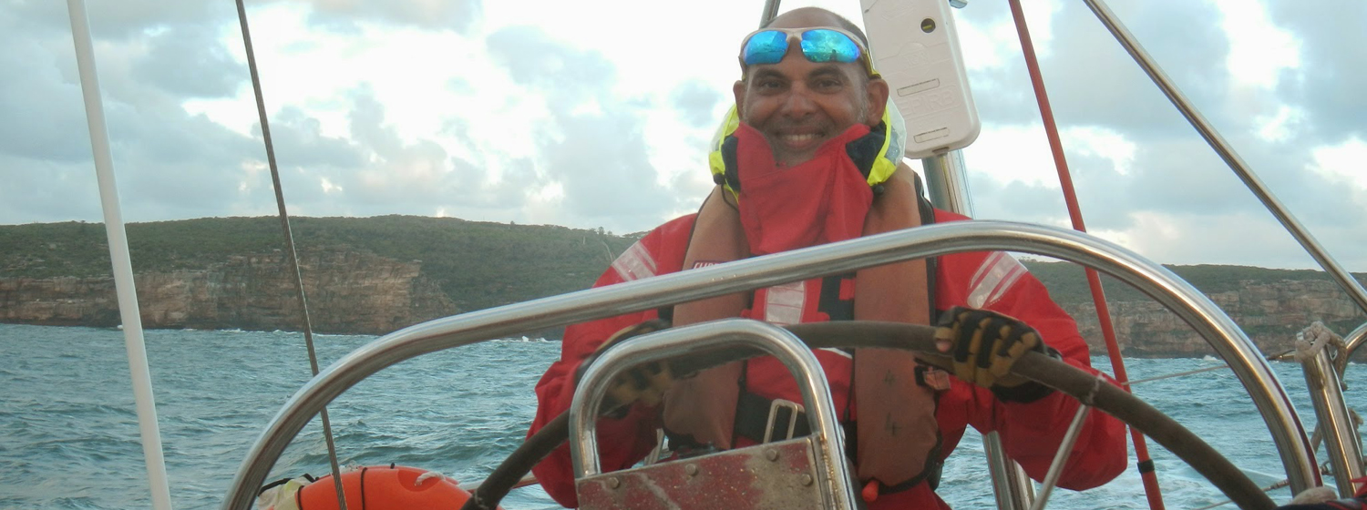 Deepak Pande behind the helm training for the Clipper Race