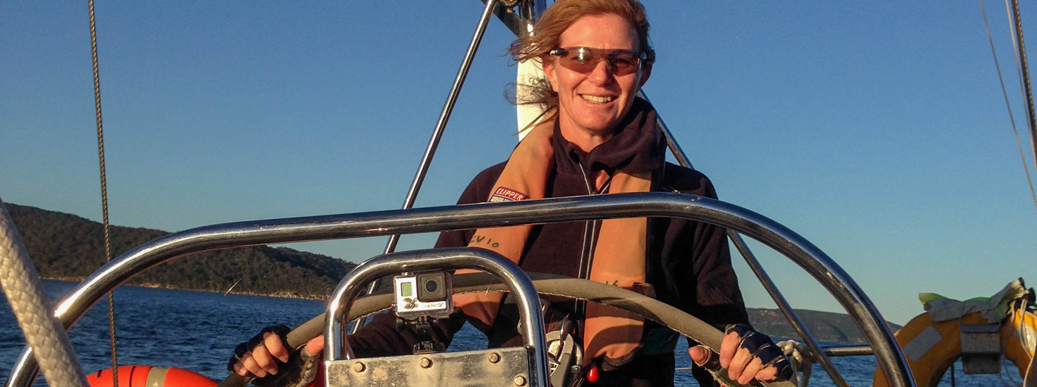 Nicolette Horak behind the helm on Clipper Race training
