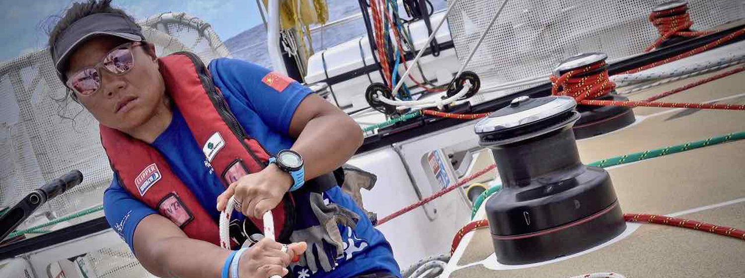 Weiwei, Sanya Ambassor, trims the sails on board Sanya Serenity Coast today