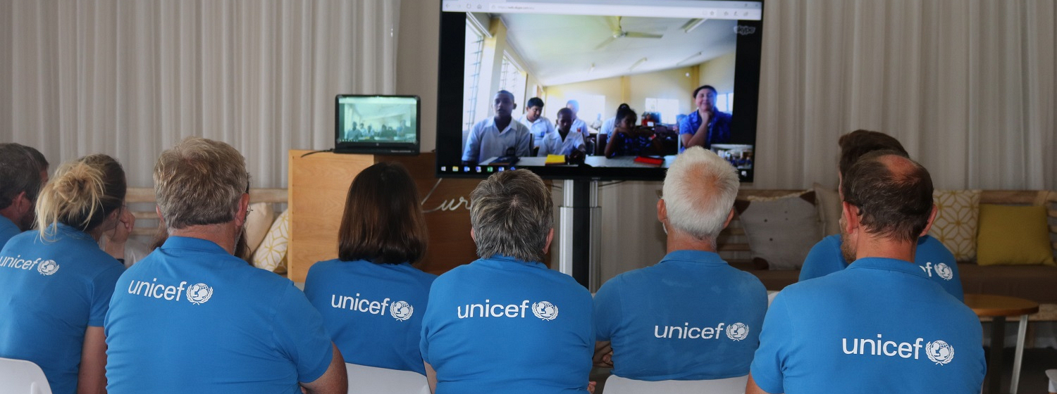 Unicef crew on skype call with children from Fiji